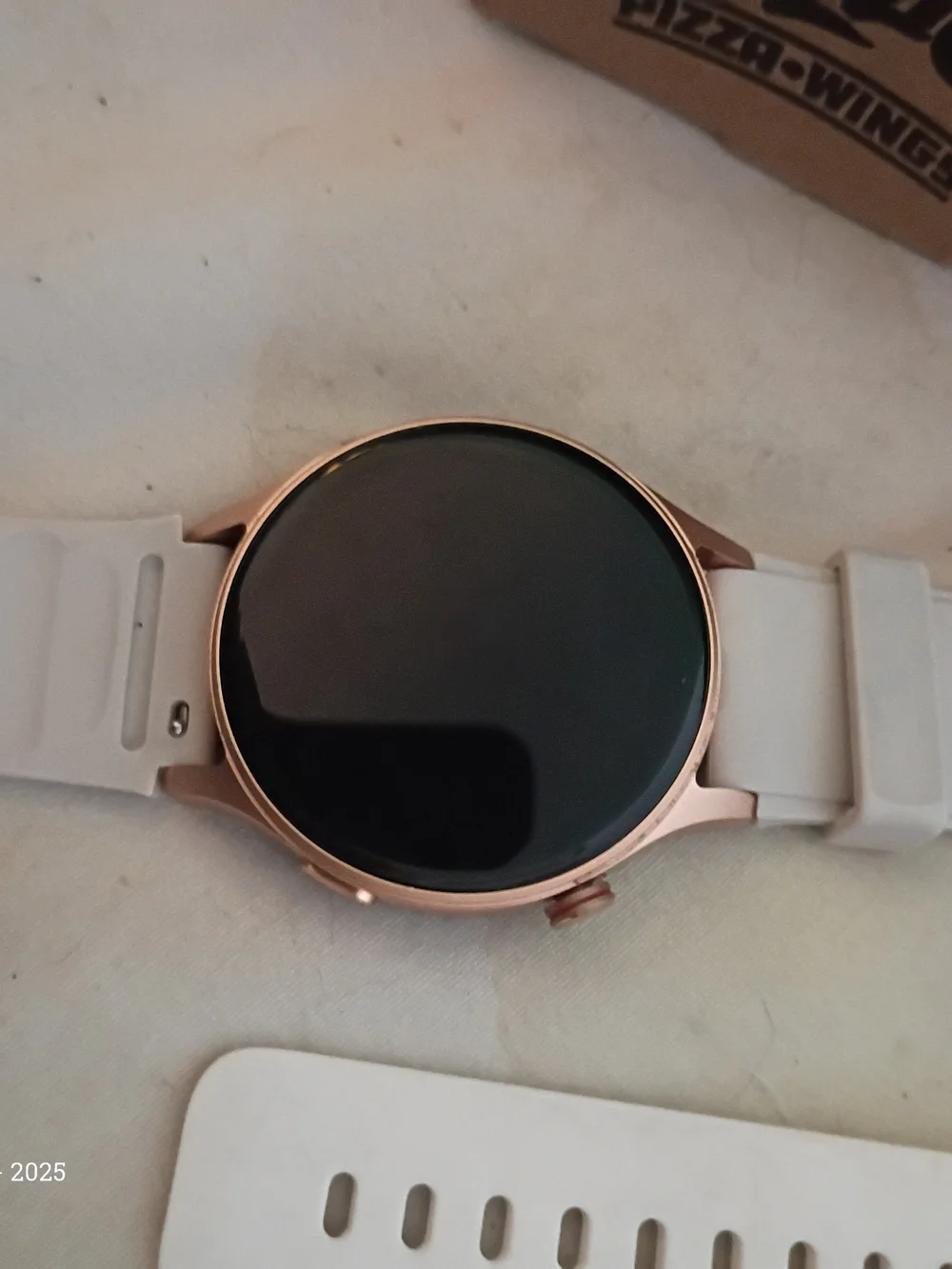 Smartwatch with White Silicone Band and Rose Gold Case